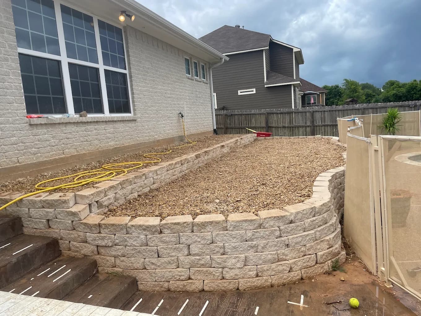 Stone retaining wall landscaping project in College Station